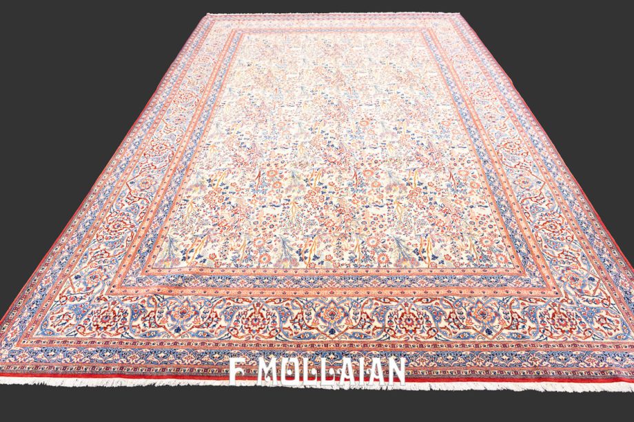 A Nain Tudeshk Antique Wool Rug with bird and floral design on a Beige all-over field woven in central Persia