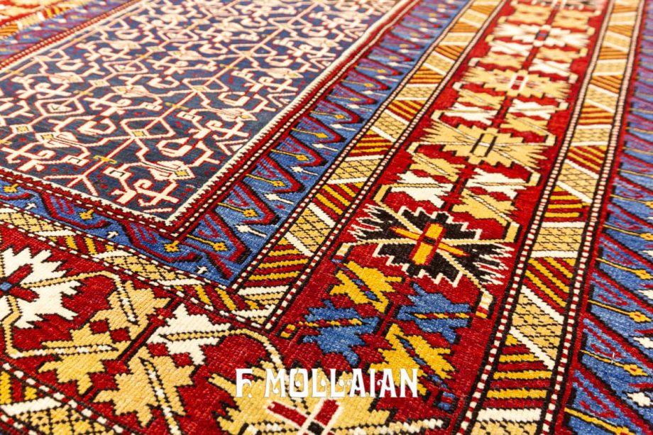 An antique caucasian Konakend Rug, all in wool with a blue All-over field and red&yellow border